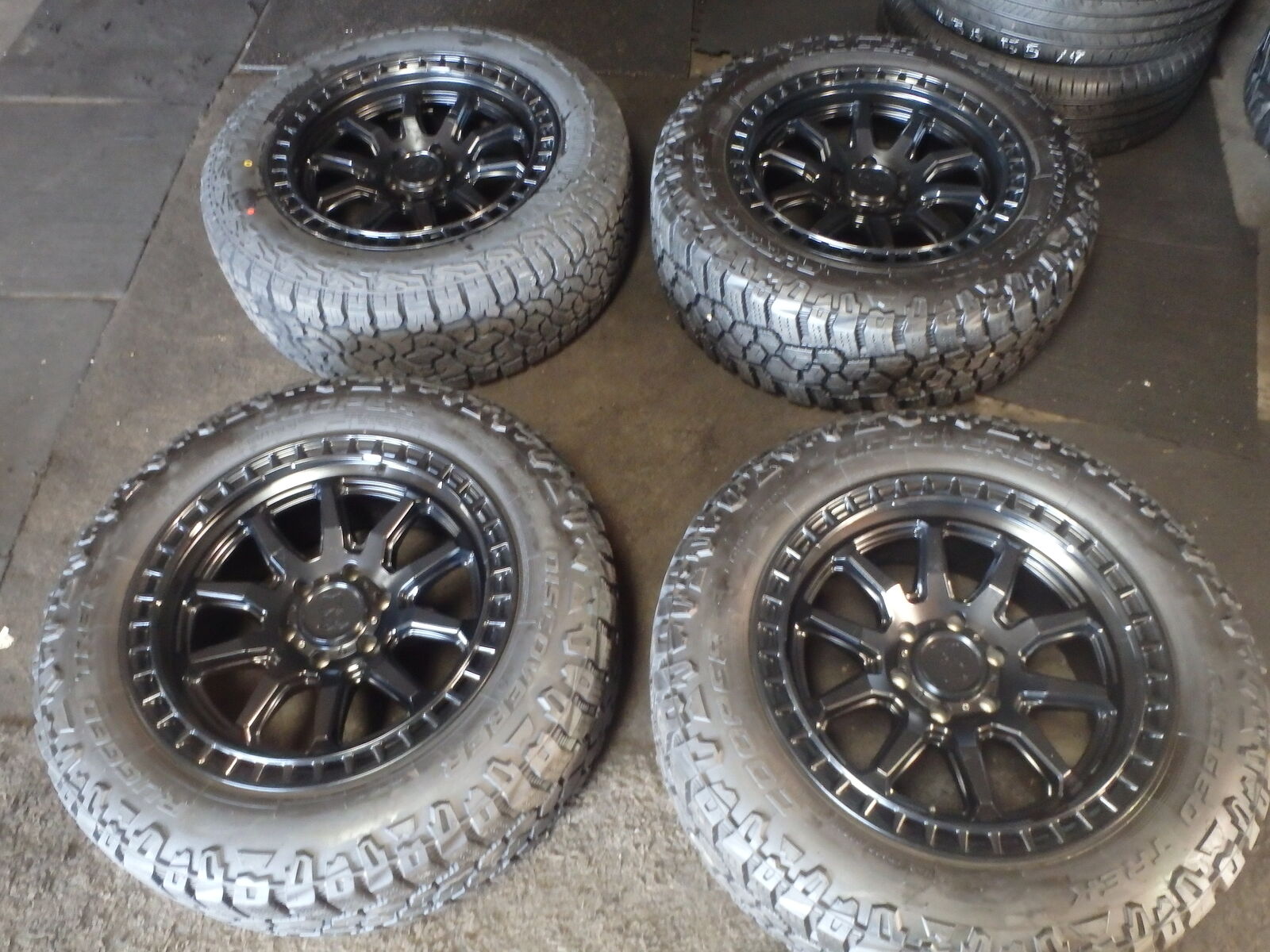 SET OF USED BLACKRINHO 20" INCH 20X9.0 AND TIRES LT265/60R20