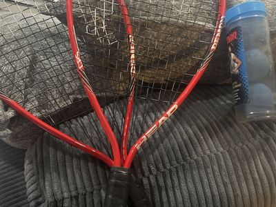 Racquetballs and 2 racquets