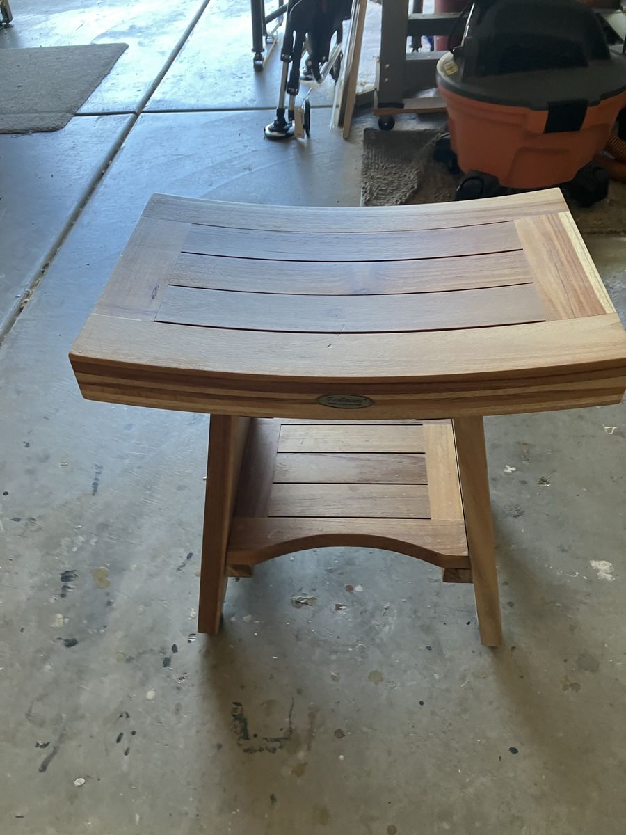 Hard wood stool 18 inches high 18 inches wide and 12 across the bench