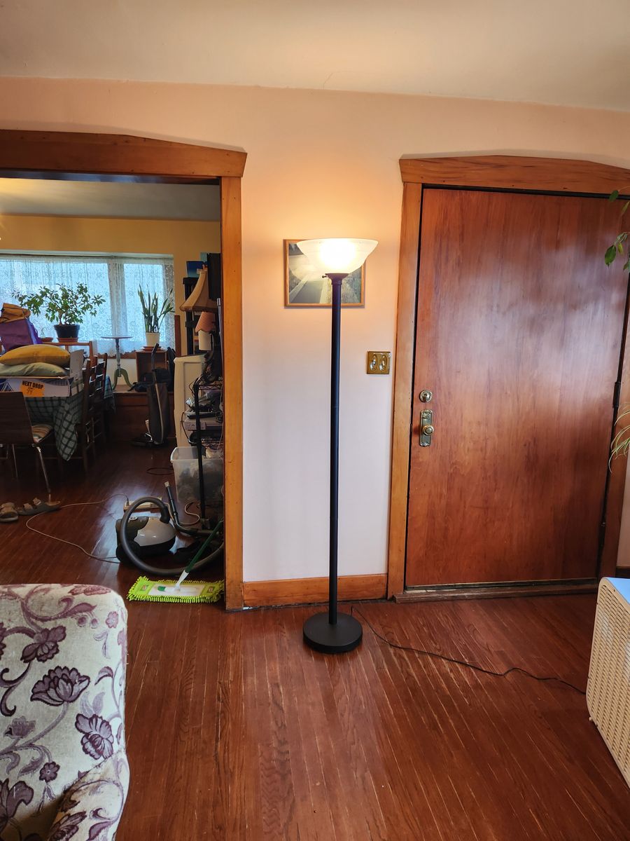 Quality torchierre lamp with nice antique looking glass lamp shade.  Very sturdy.  Works great.