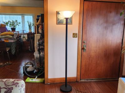 Quality torchierre lamp with nice antique looking glass lamp shade. Very sturdy. Works great.