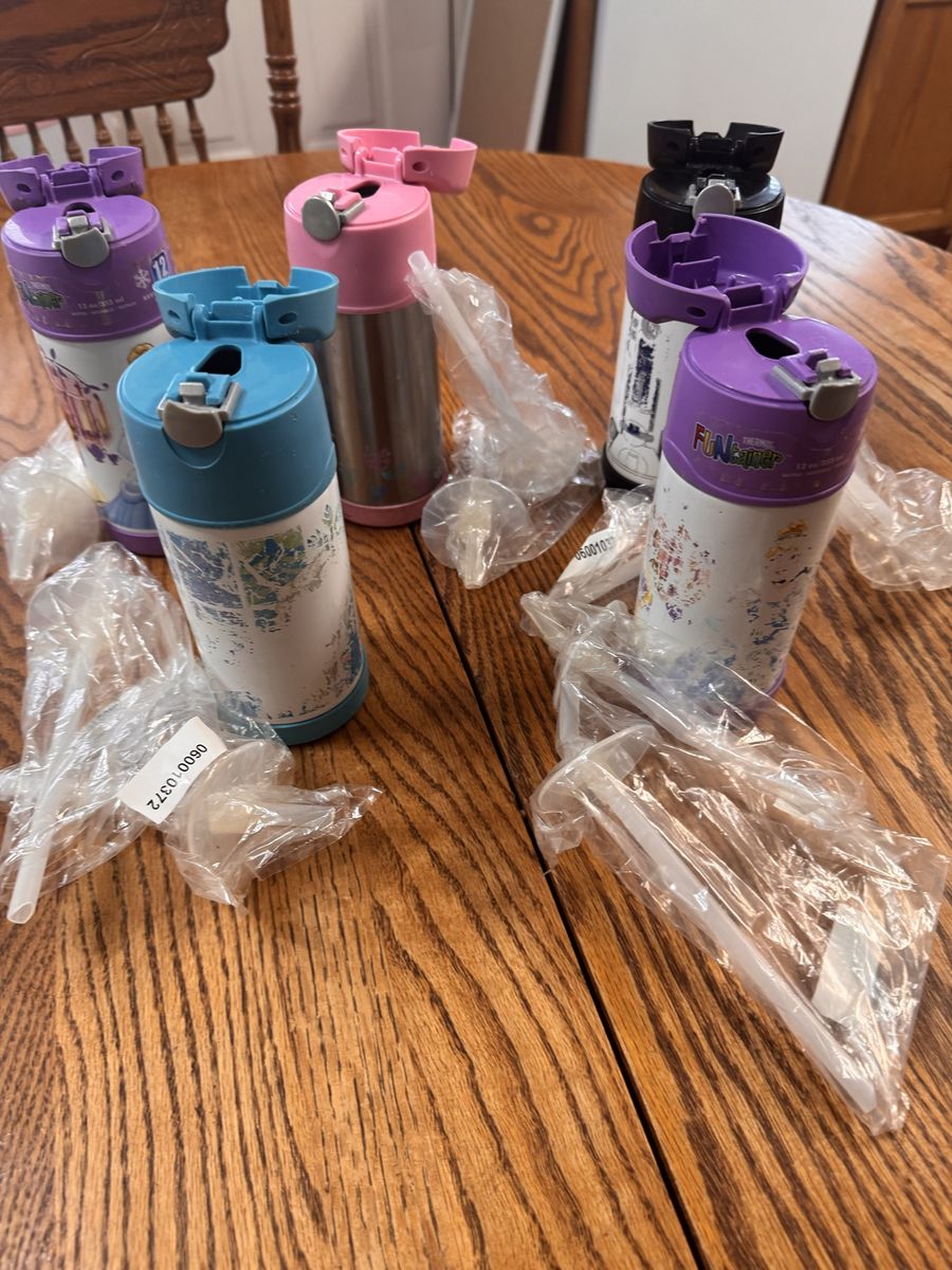 Kids drink cups with brand new straws