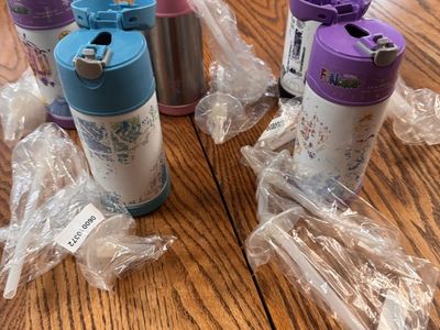 Kids drink cups with brand new straws