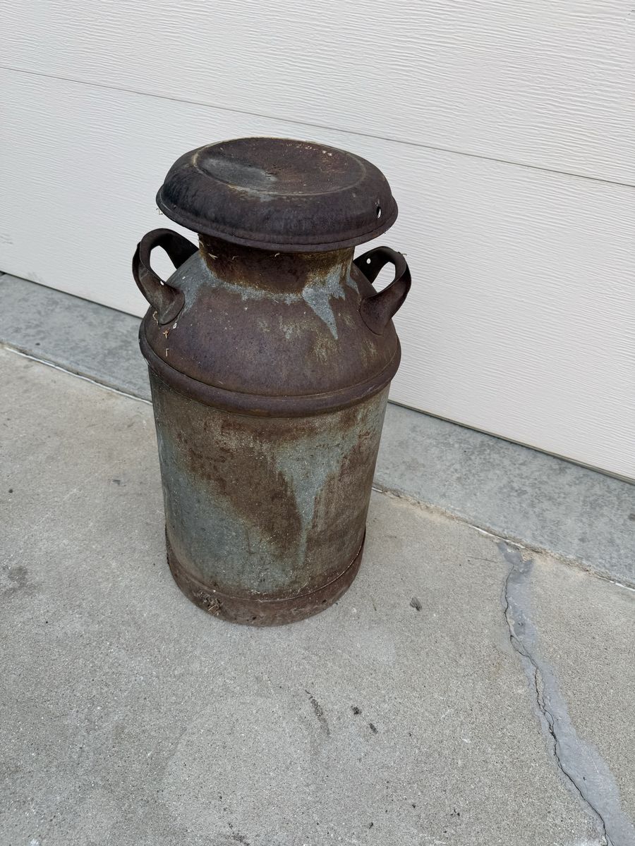 Antique milk can 25” tall