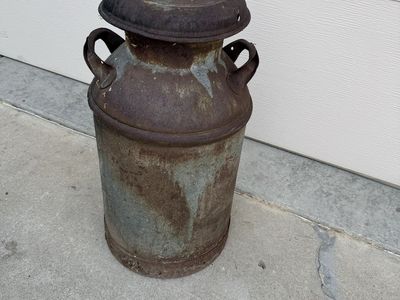 Antique milk can 25” tall