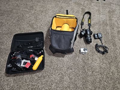 Nikon D40 DSLR Camera Bundle with older GoPro, Carrying Bag, and Accessories