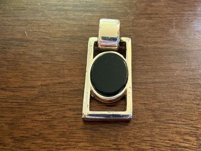 Silver Tone Rectangle Pendant w/ Black Oval Inside
