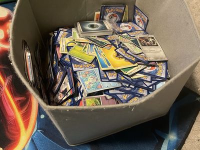 Large Bulk Lot of Assorted Pokémon Trading Cards. My guess is around 6,000 cards