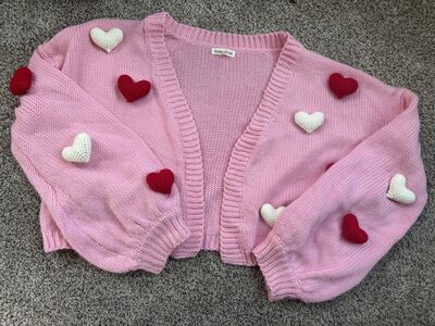 Woman’s valentines cardigan size medium