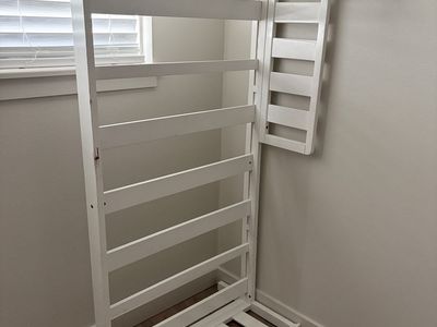 White wooden toddler bed frame