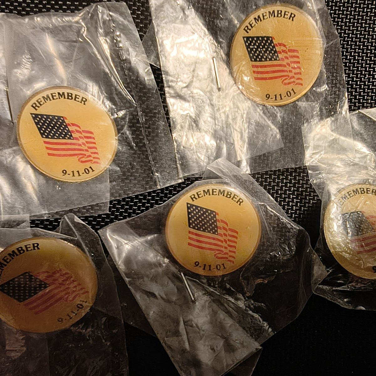 I have 5 Remember 9/11 pins 10 dollars a piece OBO