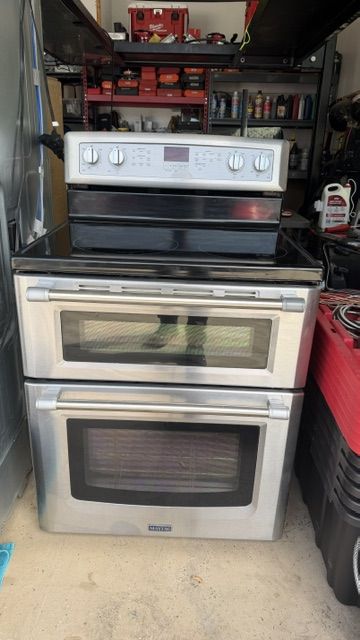 Maytag Stainless Steel Double Oven Electric Range with Glass Cooktop.