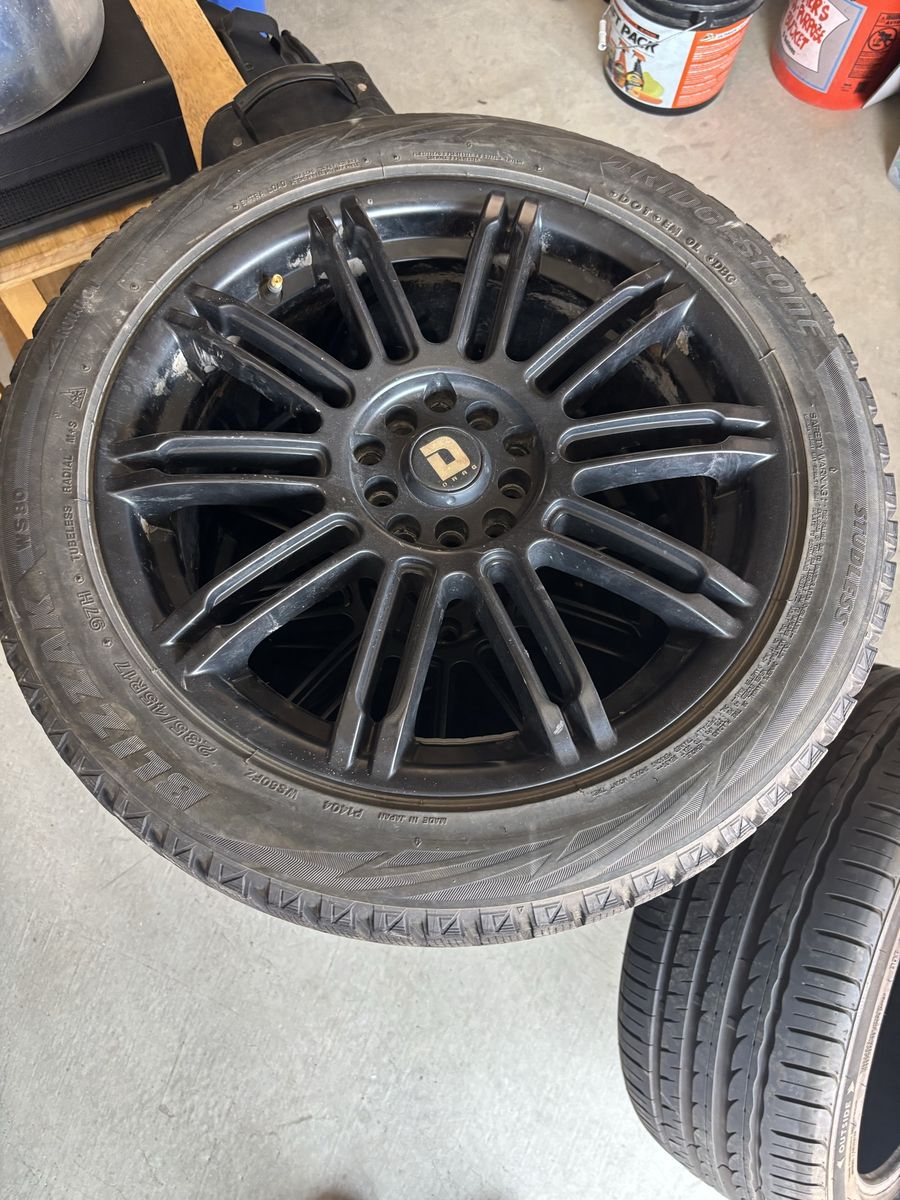 D SPORT Black 17" Wheels & Bridgestone Blizzak 225/45R17 Winter Tires - Set of 4