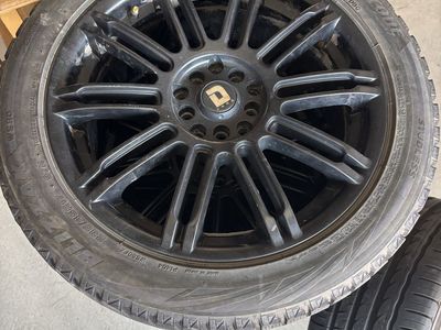 D SPORT Black 17" Wheels & Bridgestone Blizzak 225/45R17 Winter Tires - Set of 4