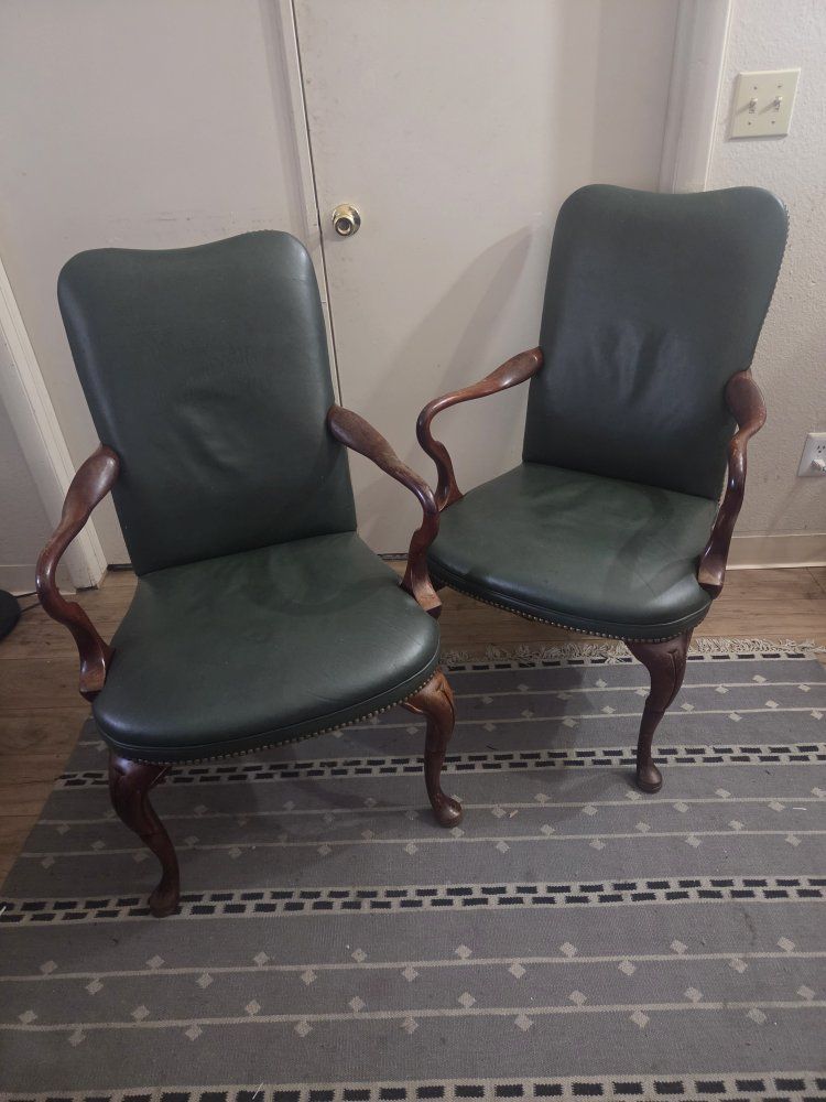 Pair of Vintage Dark Green Leather Armchairs with Nailhead Trim and Carved Wood Legs