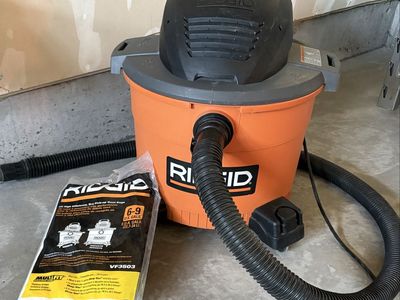 RIDGID 16 Gal. 6.5 Peak HP Wet/Dry Shop Vacuum with Detachable Hose. Includes a 2 pack of High Efficiency, Dry Pick-up Dust Bags