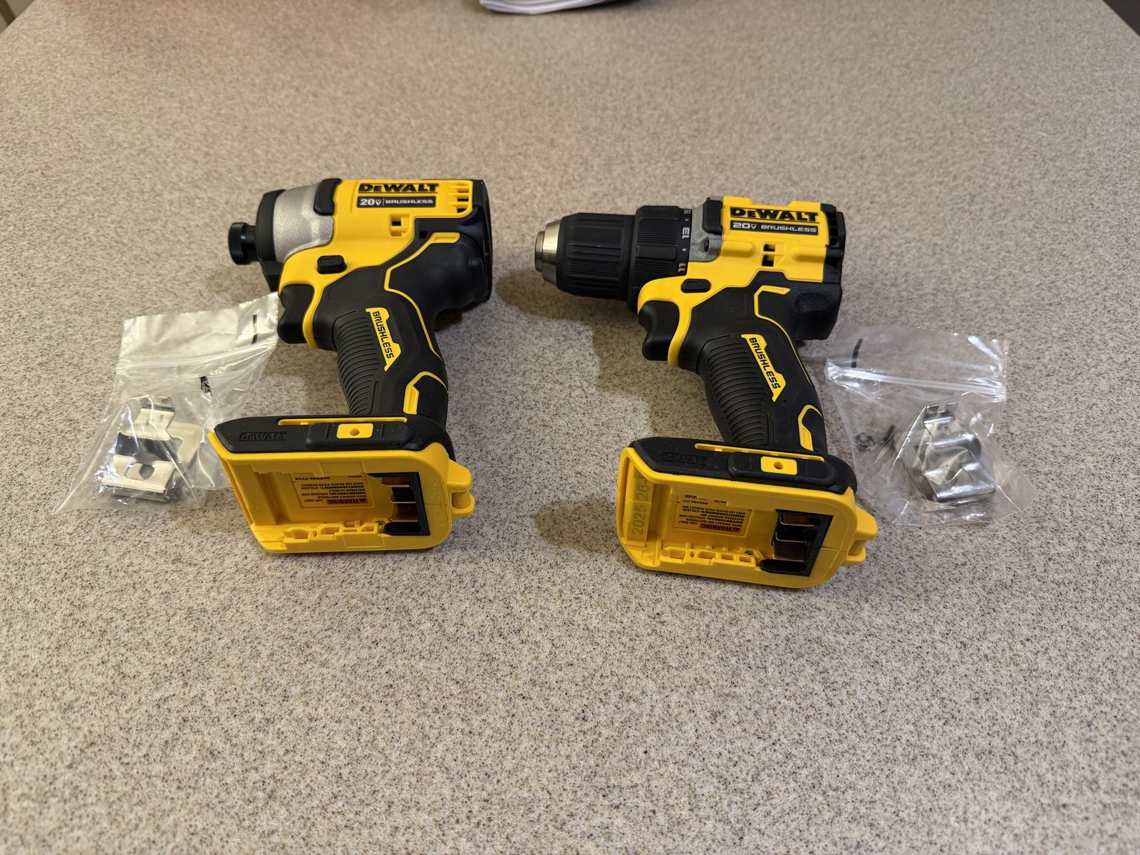 Brand new Dewalt 20V MAX Brushless Atomic impact driver and drill, tool only