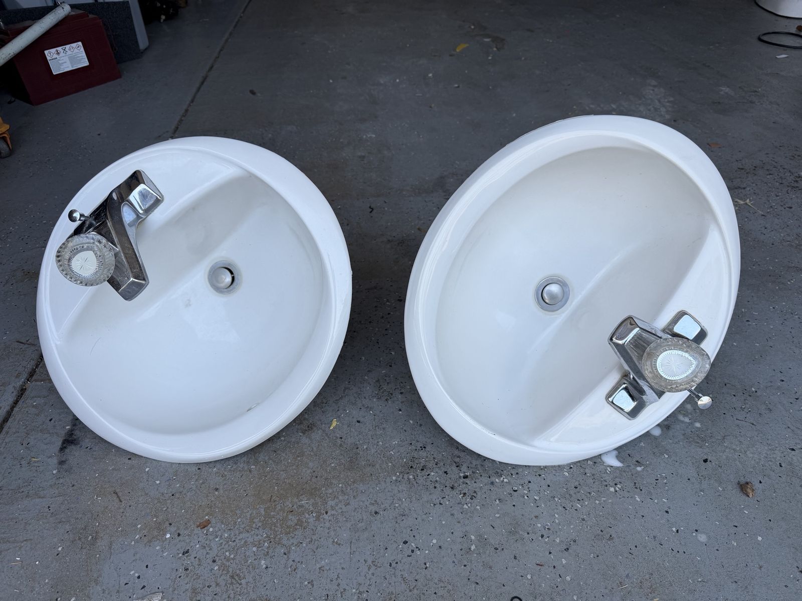Pair of White Oval Bathroom Sinks with Faucets - 20" L x 16" W