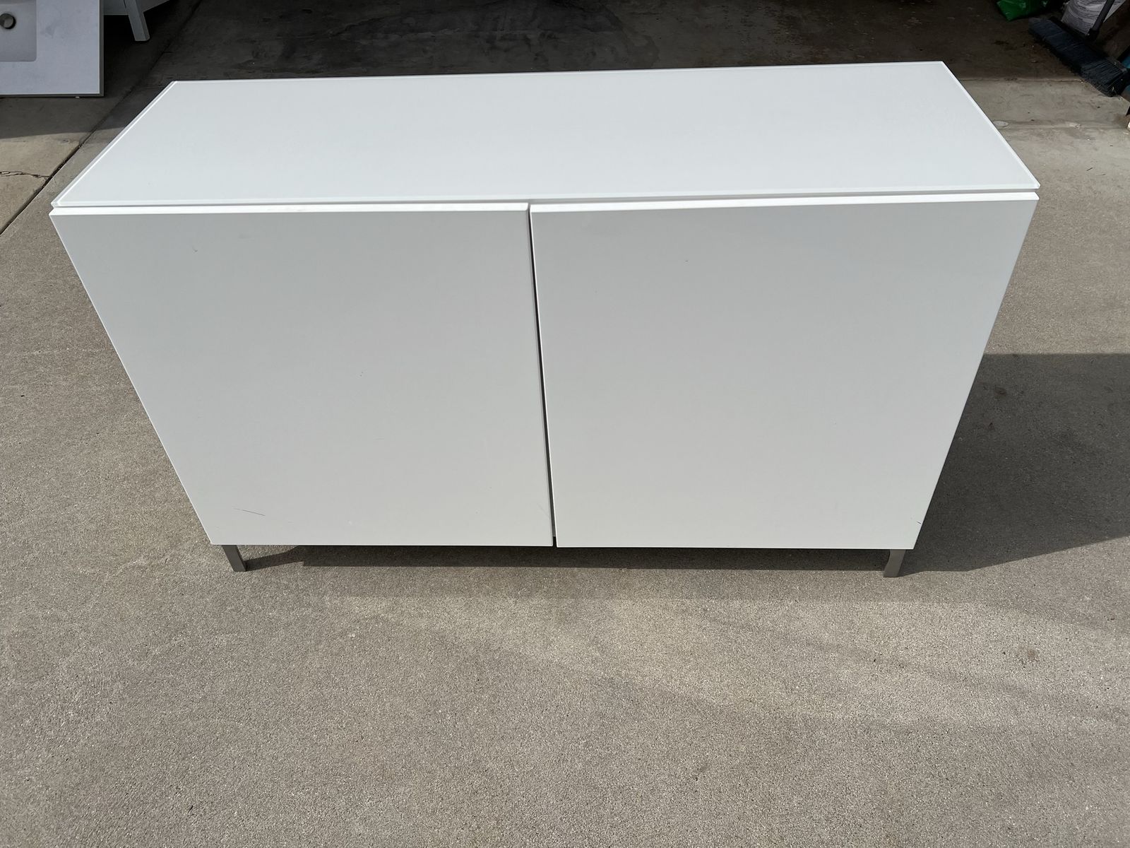 White ikea cabinet with glass top