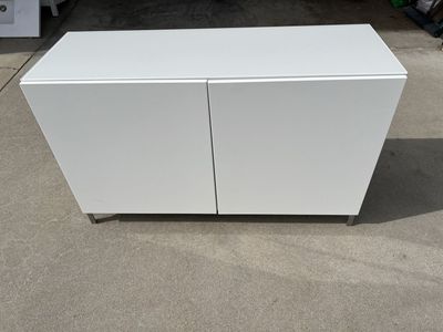White ikea cabinet with glass top