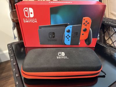 Nintendo Switch Console with Extra Neon Red & Blue Joy-Cons & Carrying Case