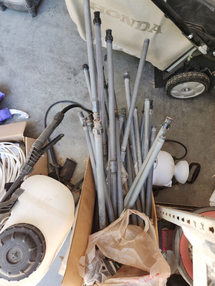 Lot of Used PVC Sprinkler Risers and Pipes in Box