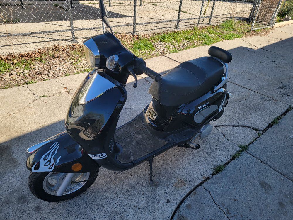 08.   150 cc scooter