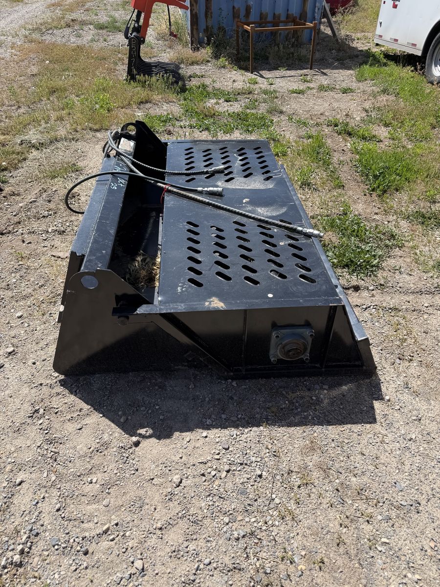 Skid steer rock rake