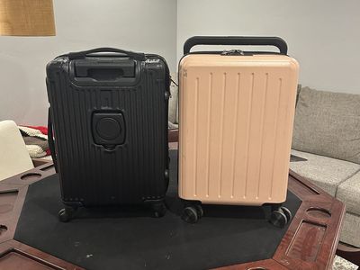 Two Carry On Suitcases — Hard Shell, Spinner Wheels (Black & Pink)