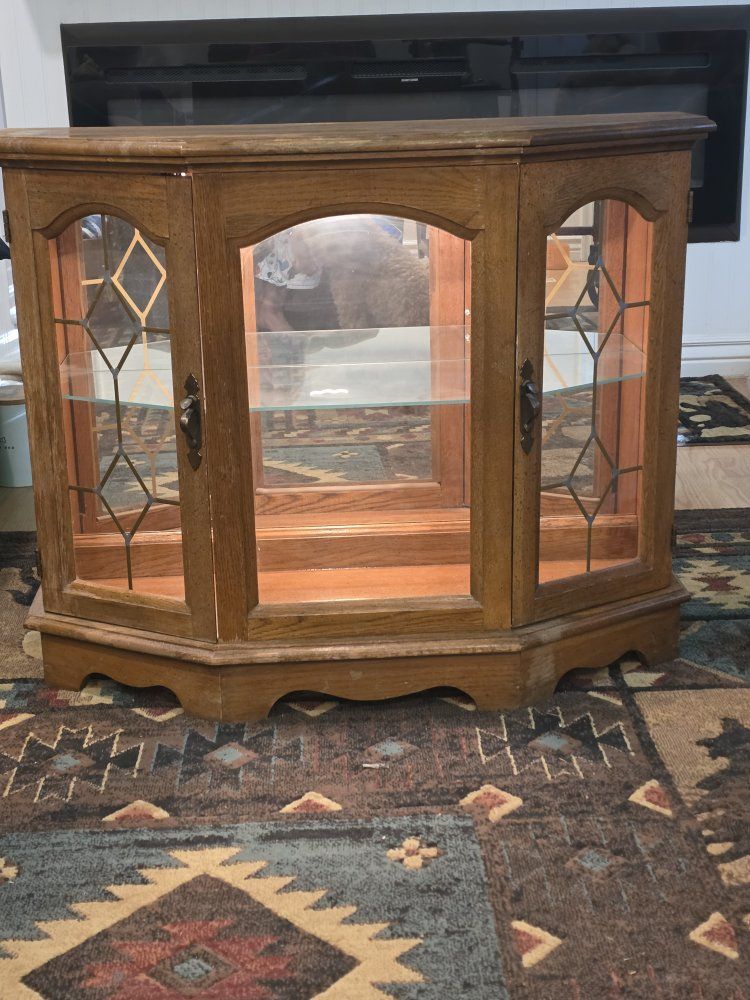 Oak mirror/glass curio cabinet