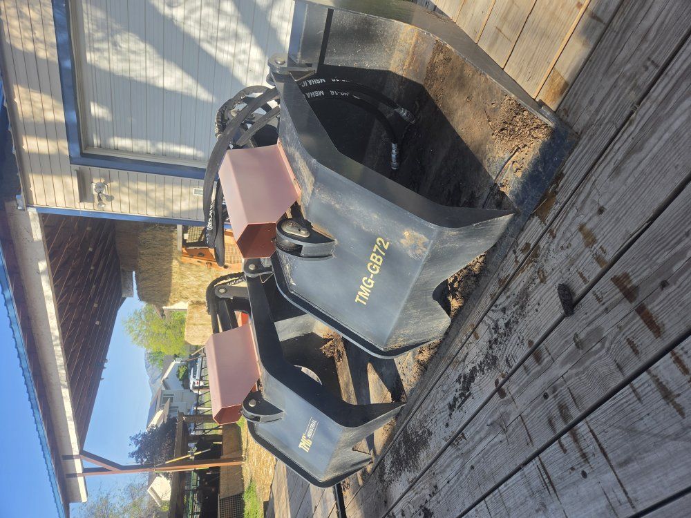 TMG Industrial grapple bucket.