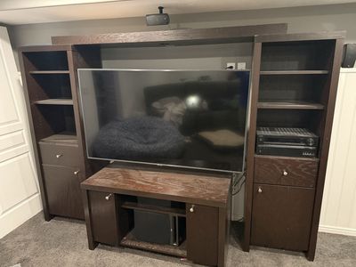 Dark Brown Wood Entertainment Center with TV Stand, Shelves, and Storage Cabinets