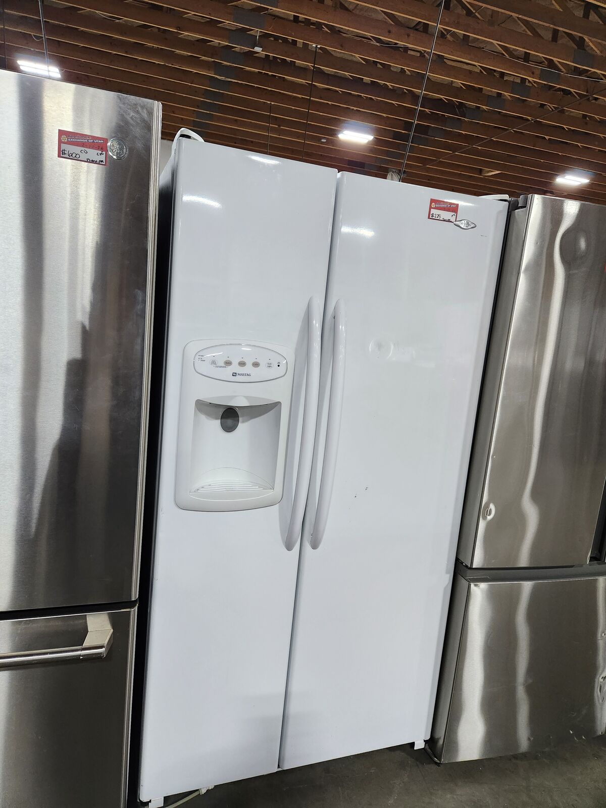 NICE MAYTAG SIDE BY SIDE FRIDGE!! WITH A FULL WARRANTY