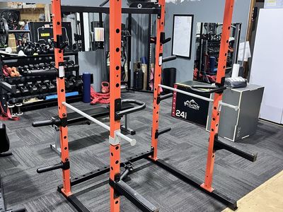 Orange & Black Power Rack with Pull-Up Bar and Dip Station