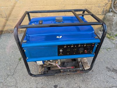 6500 watts generator. It runs great. 110 and 220 volts power supply