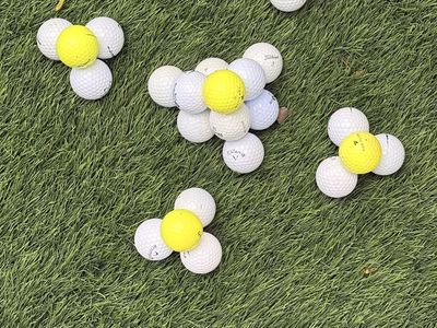 80 nearly pristine golf balls