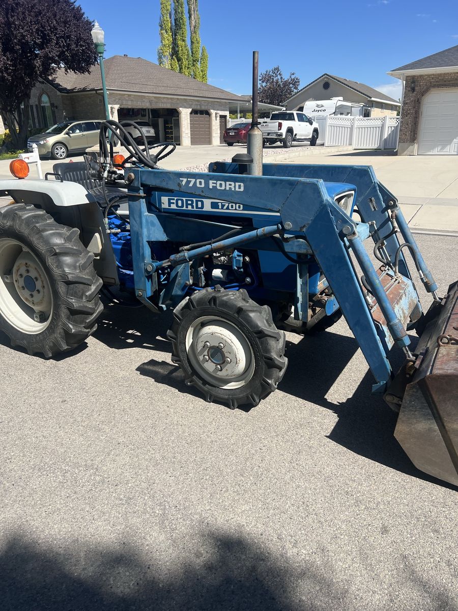 Ford 1700 with loader & blade