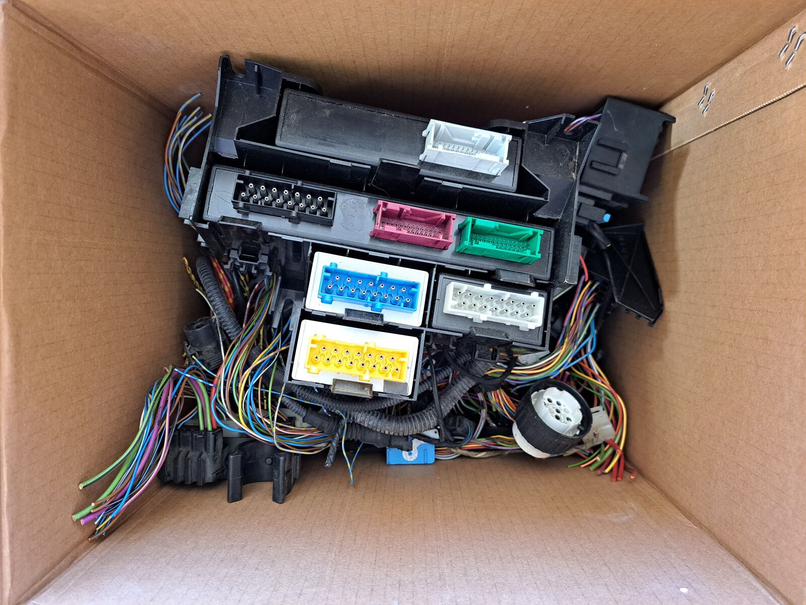 Box of BMW e36 harness pigtails and modules