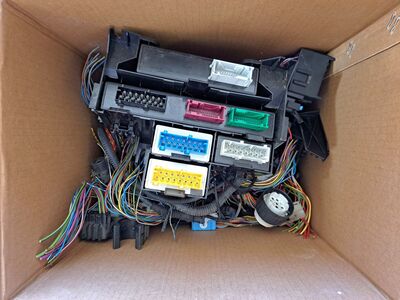 Box of BMW e36 harness pigtails and modules