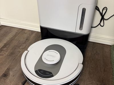 Shark AI Robot Vacuum with XL Self-Empty Base, Laser Navigation, RV2001WD, White. Comes with filters and brush replacements.