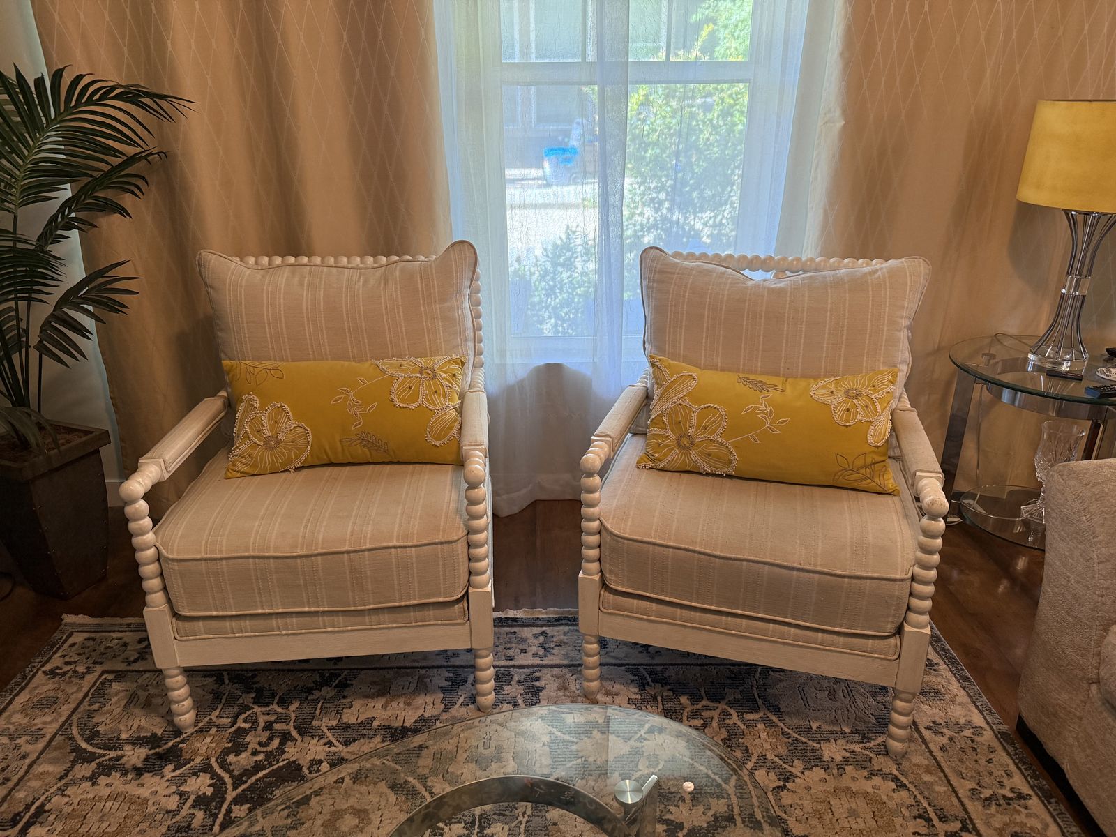 Pair of White Spool Design Armchairs with Tan Striped Upholstery and Yellow Throw Pillows