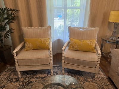 Pair of White Spool Design Armchairs with Tan Striped Upholstery and Yellow Throw Pillows