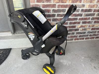 Doona Car Seat Stroller Converts with base and case