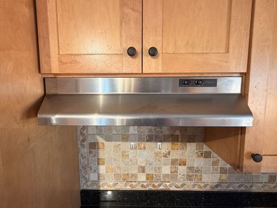 The Frigidaire is a 30-inch under-cabinet range hood - Stainless Steel