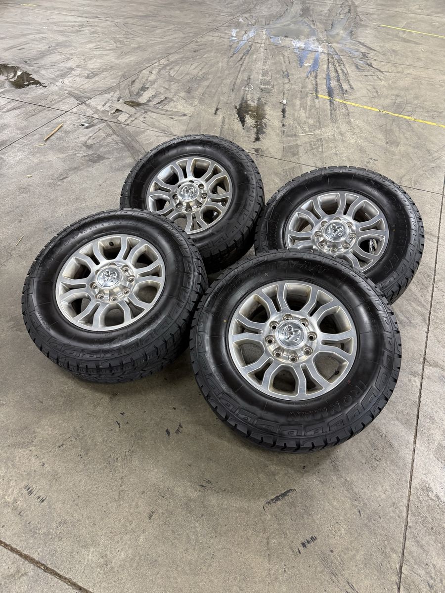 LIKE NEW ram 3500 OEM 18in takeoffs/ 275/70/18