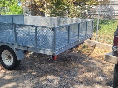 Single Axle Utility Trailer with Mesh Sides and Steel Frame
