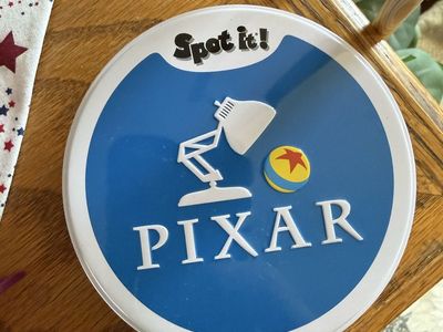 Spot It! Pixar Disney Matching Card Game in Tin - Complete Used