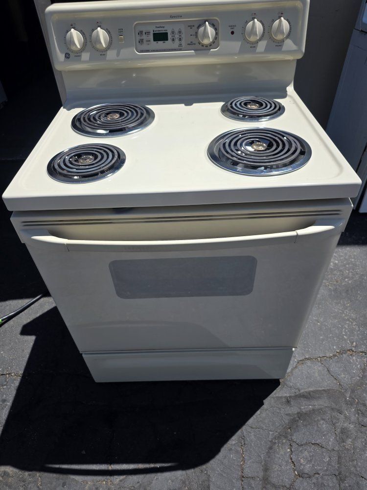 GE Spectra 30" Electric Range with Coil Burners & Self-Cleaning Oven - light cream