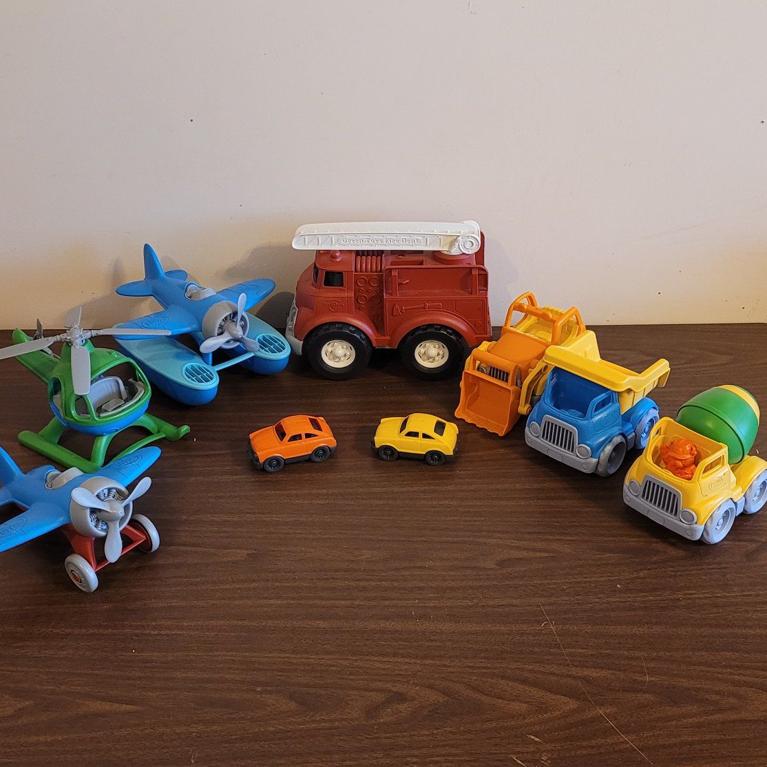 Lot of Green Toys vehicles