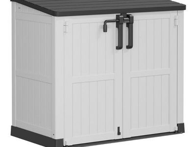 BRAND NEW OUTDOOR RESIN STORAGE SHED IN BOX 51” x 29”.